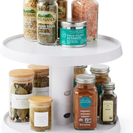 youcopia lazy susan turntable spinning inside a kitchen cabinet with spice jars