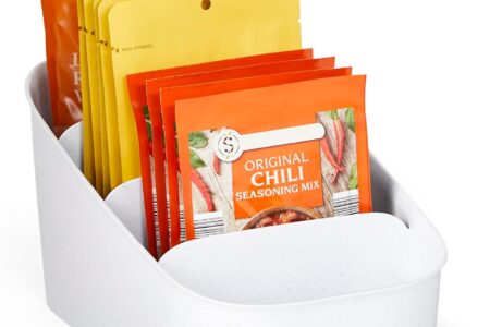 nyoucopia pantry organizers arranged on a kitchen shelf with lids and binsn