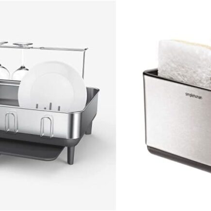 simplehuman steel frame dish rack full of plates draining into a sink
