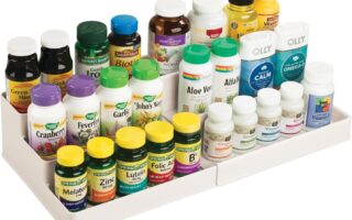 mdesign vanity organizer bin holding bottles on a bathroom countertop