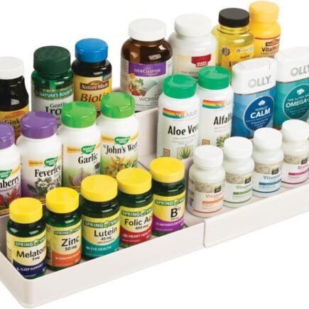 mdesign vanity organizer bin holding bottles on a bathroom countertop