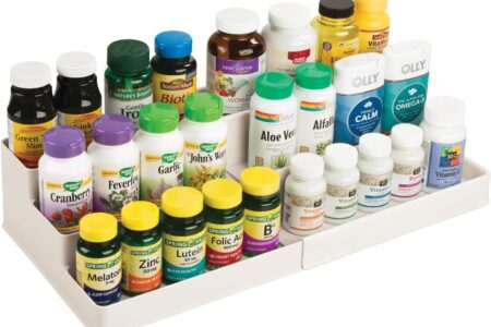 mdesign vanity organizer bin holding bottles on a bathroom countertop
