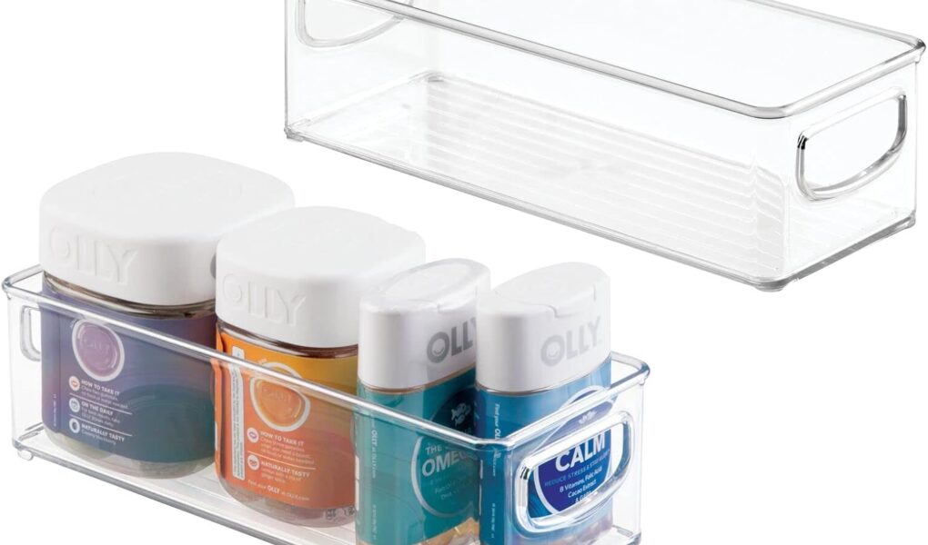 mdesign fabric storage bins stacked on a closet shelf with clear front window