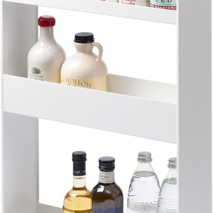 yamazaki rolling storage cart tucked into the gap beside a refrigerator
