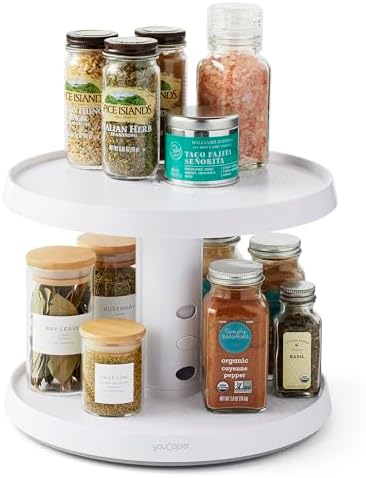 youcopia lazy susan turntable next to a tall bottle that won't clear the shelf above it